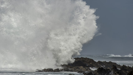 Massive Wave Breaks on Rocks