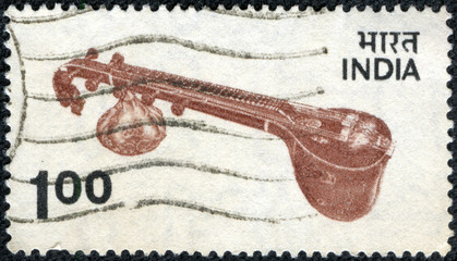 stamp printed in India, shows Veena - plucked string instrument used in Hindustani classical music,...