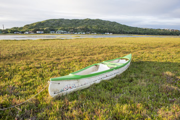 Neglected Kayak Near River