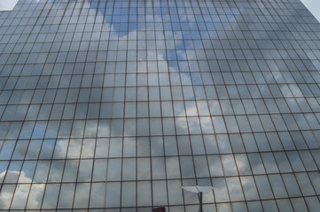 Fototapeta premium Reflection of building at building