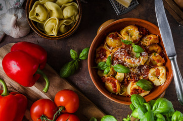 Homemade tortellini with tomato sauce