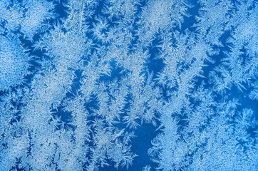 Ice patterns on glass. winter background