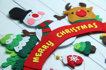 Christmas gift box cloth art adornment and golden ball on the white board