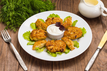 Potato pancakes for breakfast. Wooden rustic background. Top view. Close-up