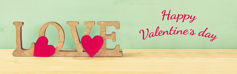 Valentines day background. Word LOVE from wooden letters