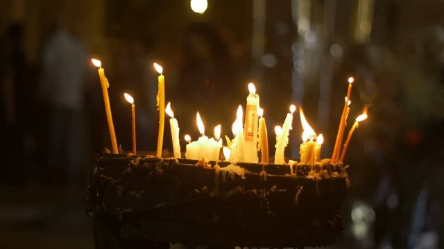 Candles in the Holy Sepulchre Church in Jerusalem