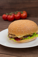 Burger of homemade close up on wooden background. Top view. -