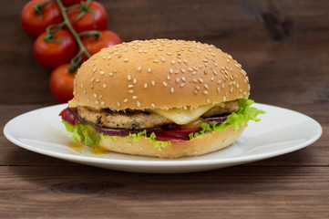 Burger of homemade close up on wooden background. Top view. -