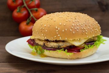 Burger of homemade close up on wooden background. Top view. -