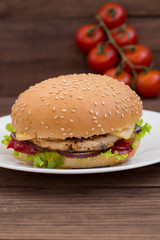 Burger of homemade close up on wooden background. Top view. -