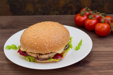 Burger of homemade close up on wooden background. Top view. -