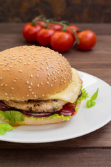 Burger of homemade close up on wooden background. Top view. -
