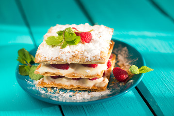 Mille-feuille of puff pastry with raspberries