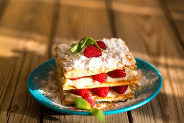 Mille-feuille of puff pastry with raspberries