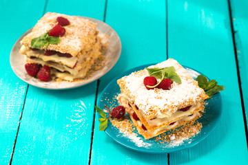 Mille-feuille of puff pastry with raspberries