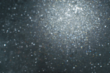 Obraz premium Dark frost with sparkles on the window at night