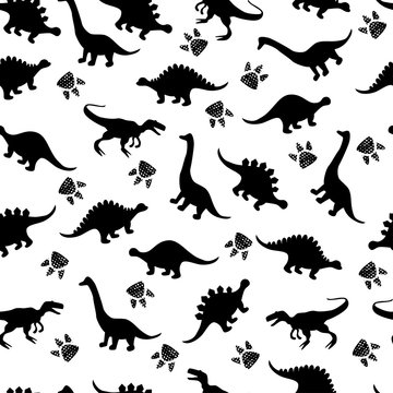 Cute kids pattern for girls and boys. Colorful dinosaurs on the abstract grunge background create a fun cartoon drawing. The background is executed in monochrome colors. For textile and fabric