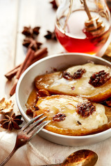 Baked pears with honey stuffed with gorgonzola cheese and walnuts