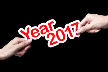 New year 2017 with hand. New year is the first day of the year in the Gregorian calendar.
