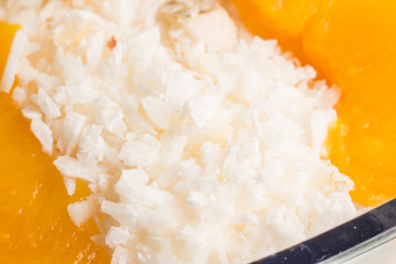 Peach with grated coconut