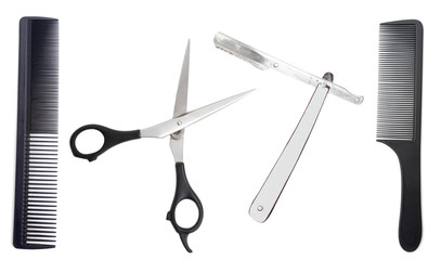 Comb with scissors and razor on a white background