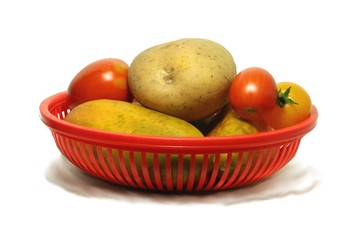 vegetables in a red basket
