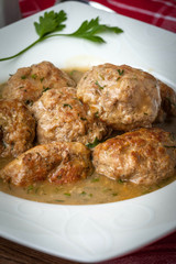 Pork meatballs with dill sauce.