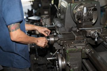 Fototapeta na wymiar Metalworking industry and lathe machine