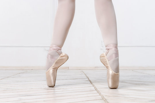 Close-up Legs Of Young Ballerina  