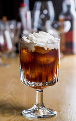 drink in a beautiful glass on the bar