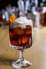 drink in a beautiful glass on the bar