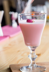 drink in a beautiful glass on the bar