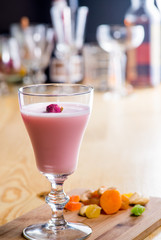 drink in a beautiful glass on the bar