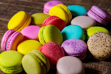 multicolored macaroon on a wooden table