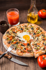 Vegetarian pizza. Old background. Close-up