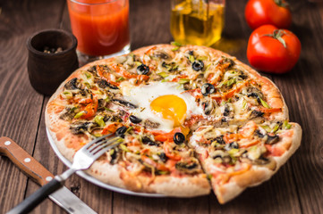 Vegetarian pizza. Old background. Close-up
