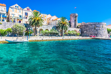 Korcula town coastline view. / View at coastal town and promenade in place Korcula in Croatia,...