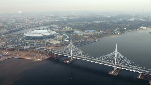 Aerial view of the stadium Zenit arena and modern Cable stayed bridge across the Neva a part of WHSD