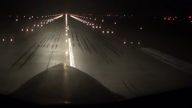 The plane takes off at night