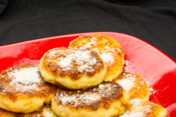 red plate of pancakes