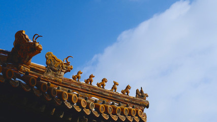 This is the eaves of a traditional Chinese building. It has very oriental structure and shows the eastern culture.