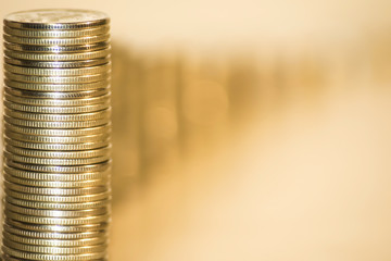 Coins stacked in bars . The concept of market instability