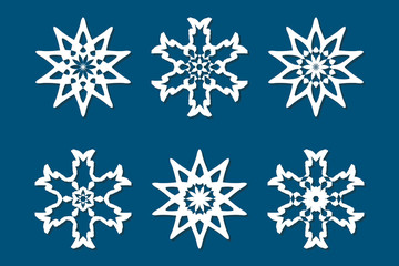 Fototapeta na wymiar Snowflake set. Laser cut pattern for christmas paper cards, wood carving, paper cutting, design elements, scrapbooking. Collection of different white snowflakes on blue background