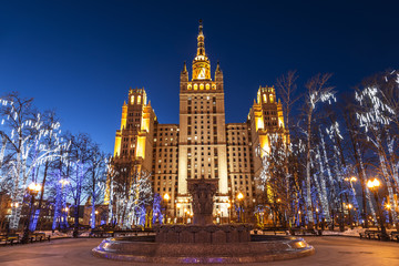 High-rise building on Uprising square in christmas decoration at night, Moscow, Russia