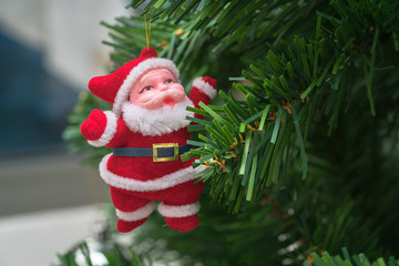 Christmas tree and Santa doll
