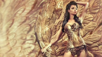 Portrait of a sensual queen of gold