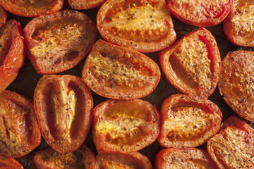 tomato halves roasting in the oven