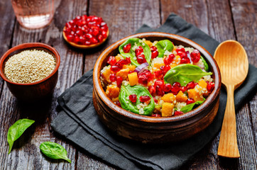 Pomegranate sweet potato quinoa spinach salad