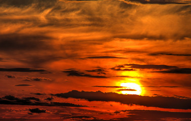 Fototapeta na wymiar Beautiful sunset with dramatic clouds on the sky