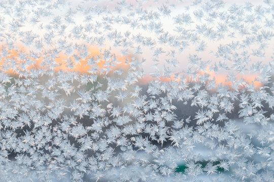 frozen crystals on the window, winter background